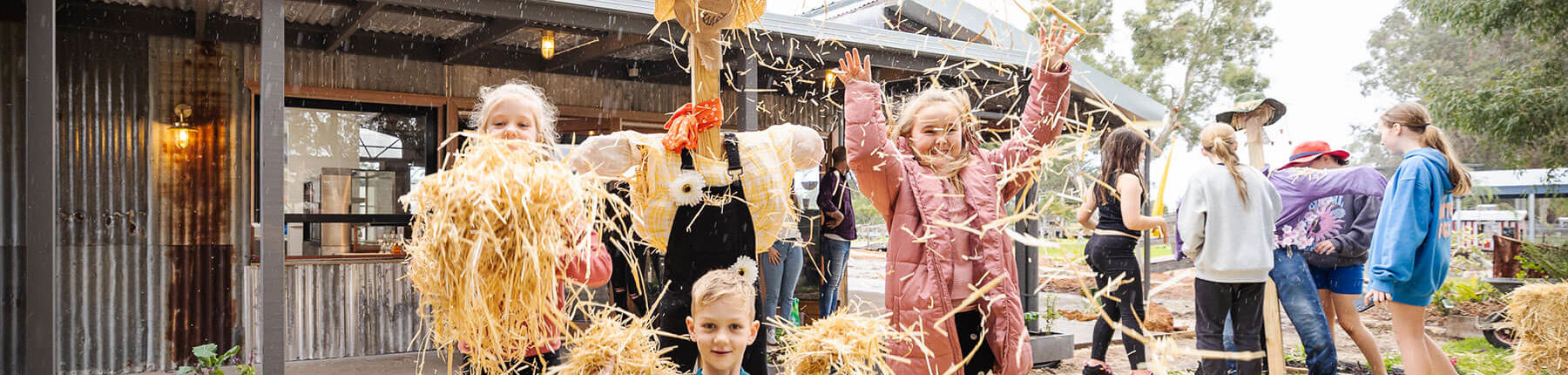 Kids Making Scarecrows At Cubby Cafe For A Birthday Party